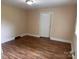 Bedroom with updated flooring, neutral paint, and natural light at 1849 Hilltop Cir, Gastonia, NC 28054