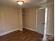Bedroom features new flooring with natural light at 1849 Hilltop Cir, Gastonia, NC 28054