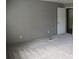 Spacious bedroom with neutral carpet and grey walls at 1856 Kemp Cir, Shelby, NC 28152