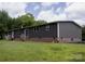 Home exterior featuring a backyard and deck at 1856 Kemp Cir, Shelby, NC 28152