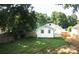 Spacious backyard features a well-maintained lawn, new fence, and a charming deck at 1919 Gay St, Statesville, NC 28625