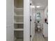 This bathroom offers a toilet, vanity, and built in shelving at 1919 Gay St, Statesville, NC 28625