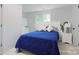 Cozy bedroom features a comfortable bed, side table, and bright natural light from a window at 1919 Gay St, Statesville, NC 28625