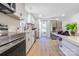 Well-equipped kitchen with stainless steel appliances and ample counter space, flowing into the dining area at 1919 Gay St, Statesville, NC 28625