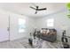 Well-lit living room featuring a modern sofa, neutral walls, and stylish decorations at 1919 Gay St, Statesville, NC 28625