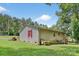Exterior view showing stone foundation and yard at 2611 Dallas Stanley Hwy, Stanley, NC 28164