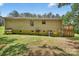 Exterior view showing stone foundation and yard at 2611 Dallas Stanley Hwy, Stanley, NC 28164