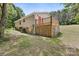 Exterior view showing stone foundation and deck at 2611 Dallas Stanley Hwy, Stanley, NC 28164