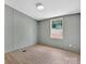 This bedroom features wood-look flooring and neutral walls at 2611 Dallas Stanley Hwy, Stanley, NC 28164