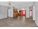 Large living room with neutral paint, updated kitchen, and vinyl floors at 2611 Dallas Stanley Hwy, Stanley, NC 28164