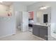 Light and airy bathroom with gray cabinets, granite counters, and modern fixtures at 330 Waters Rd, Salisbury, NC 28146