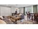 This living room features neutral furniture, a decorative rug, and access to an outdoor space at 330 Waters Rd, Salisbury, NC 28146