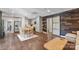 Open-concept living area, dining room, and kitchen featuring modern decor and hardwood floors at 330 Waters Rd, Salisbury, NC 28146