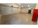 This expansive three-car garage boasts ample space and features three large doors at 4033 Hilton Lake Rd, Kannapolis, NC 28083