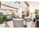 Open-concept living room featuring a modern sofa and seamless flow to the kitchen at 4033 Hilton Lake Rd, Kannapolis, NC 28083