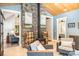 Inviting space with stone fireplace and seamless access to other areas of the home at 4033 Hilton Lake Rd, Kannapolis, NC 28083