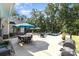 Inviting backyard oasis featuring a sparkling in-ground pool, lounge chairs, and a lush treeline at 4033 Hilton Lake Rd, Kannapolis, NC 28083