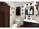 Charming bathroom with decorative accents, a single sink, and shower with curtain at 6421 Hidden Forest Dr, Charlotte, NC 28213
