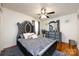 This bedroom features a mirrored dresser and a luxurious, padded headboard at 6421 Hidden Forest Dr, Charlotte, NC 28213