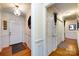 Welcoming foyer features hardwood floors and decorative accents throughout the area at 6421 Hidden Forest Dr, Charlotte, NC 28213