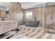 Elegant bathroom with modern tiling, soaking tub, and glass shower door at 715 N Graham St # 207, Charlotte, NC 28202