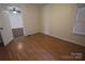 Bedroom with light wood flooring, natural light from a large window, and door to adjacent room at 1257 Reese Roach Rd, Rock Hill, SC 29730
