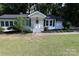 Inviting front entrance with well-manicured landscaping and a cozy porch at 1257 Reese Roach Rd, Rock Hill, SC 29730