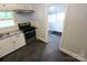 Cozy kitchen with gray tile floors, granite counters, and stainless steel range at 1257 Reese Roach Rd, Rock Hill, SC 29730
