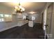 Bright kitchen with new finishes, a center island, and modern lighting at 1257 Reese Roach Rd, Rock Hill, SC 29730