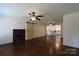Inviting living room with wood floors, fireplace, and barn door access at 1257 Reese Roach Rd, Rock Hill, SC 29730