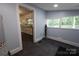 Convenient mud room area with tile flooring and kitchen view at 1257 Reese Roach Rd, Rock Hill, SC 29730