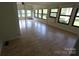 Bright sun room with many windows, light colored walls, and light wood floors at 1257 Reese Roach Rd, Rock Hill, SC 29730