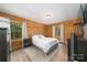 Serene bedroom with hardwood flooring and natural lighting at 164 Pleasant Creek Dr, Cleveland, NC 27013