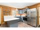 Well-equipped kitchen featuring stainless steel appliances, white countertops, and custom cabinetry at 164 Pleasant Creek Dr, Cleveland, NC 27013