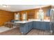 Charming kitchen featuring blue cabinetry, white counter tops, and stainless steel appliances at 164 Pleasant Creek Dr, Cleveland, NC 27013