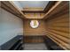 Walk-in closet boasting wood finishes, ample shelving, and a built in bench with a circular mirror at 164 Pleasant Creek Dr, Cleveland, NC 27013