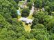 Birds eye view of the home showcasing lush surroundings and a peaceful neighborhood at 222 Laramie Dr, Stanley, NC 28164