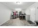 Clean basement area with tiled flooring, functional storage solutions, and ample space at 222 Laramie Dr, Stanley, NC 28164