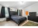 Serene bedroom with a dark-toned bed, matching furniture, and a peaceful ambiance at 222 Laramie Dr, Stanley, NC 28164