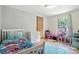 Charming bedroom with a single bed, bright rug, and playful decor, perfect for a  at 222 Laramie Dr, Stanley, NC 28164