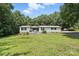 Charming single-story home with a well-manicured lawn, and a welcoming front porch at 222 Laramie Dr, Stanley, NC 28164