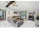 Inviting living room showcasing a plush sectional sofa, modern decor, and access to the outdoors at 222 Laramie Dr, Stanley, NC 28164