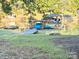 Tranquil scene showcasing a covered boat slip and easy access to the water at 287 Ben Eller Ln, Taylorsville, NC 28681