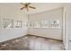 Bright living room with multiple windows and ceiling fan at 404 Community St, Rock Hill, SC 29730