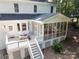 Charming outdoor space with a screened porch, deck, and ample seating for entertaining at 480 Robinson Rd, Mooresville, NC 28117