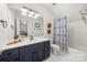Bathroom with a white counter, a blue vanity, and a shower at 480 Robinson Rd, Mooresville, NC 28117
