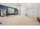 Spacious bonus room features a ceiling fan and a variety of spaces for children to play and explore at 480 Robinson Rd, Mooresville, NC 28117