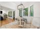 Breakfast nook with bay windows offering wooded views and natural light at 480 Robinson Rd, Mooresville, NC 28117
