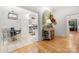 Arched entryway features an ornate wooden front door and stylish wall decor at 480 Robinson Rd, Mooresville, NC 28117