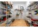 Spacious walk-in pantry with ample shelving for organized storage at 480 Robinson Rd, Mooresville, NC 28117